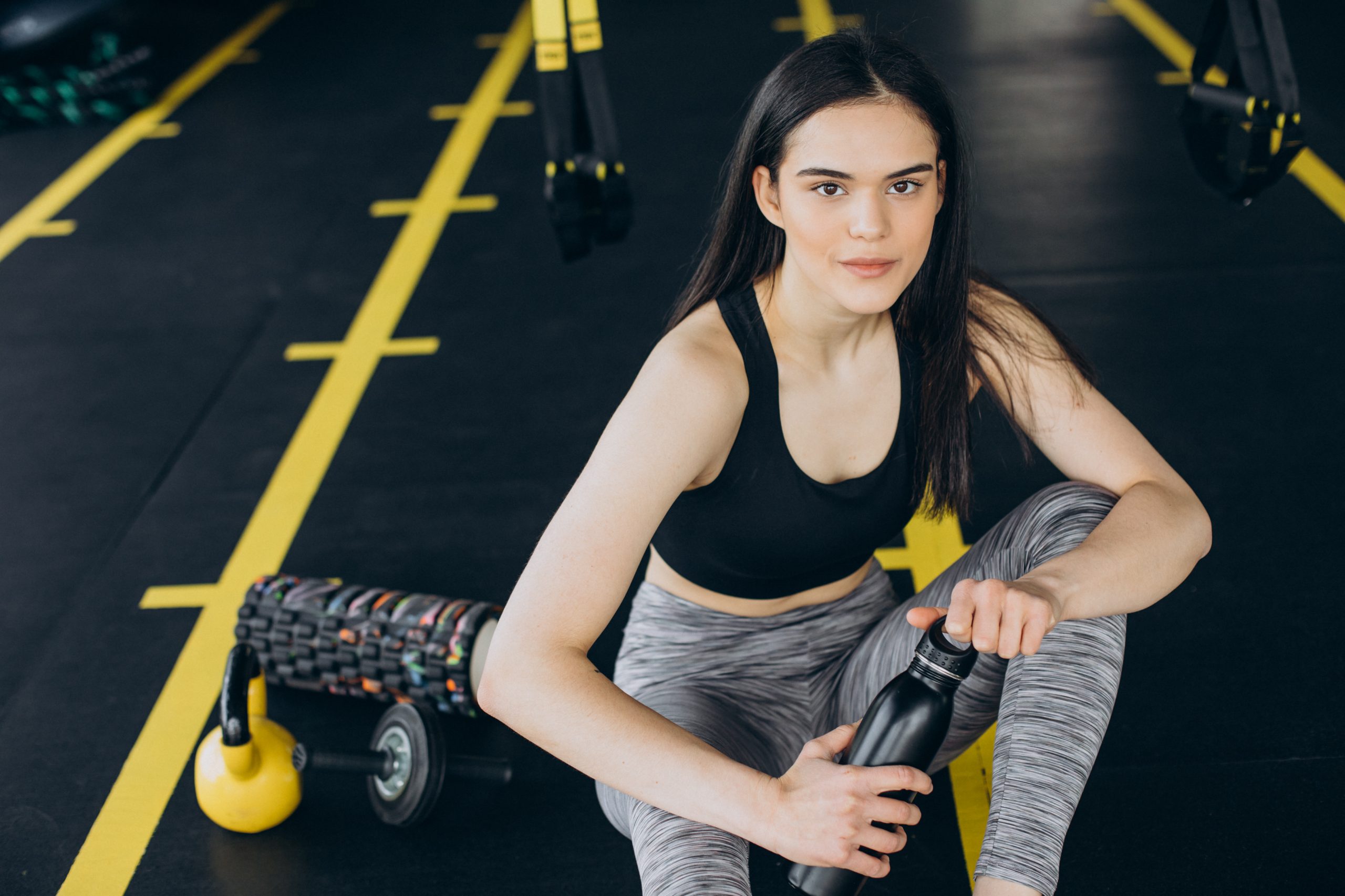 Fitness girl in a gym - Crossfit - women's in crossfit