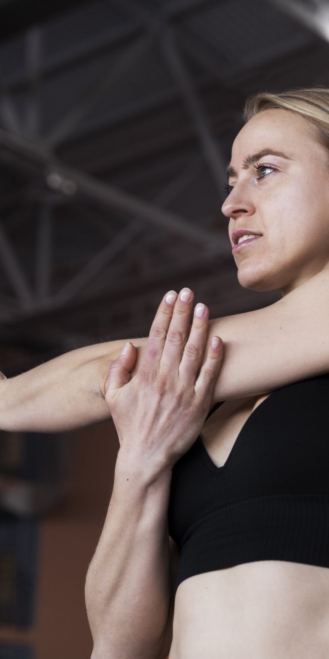 Medium shot woman wearing headphones
